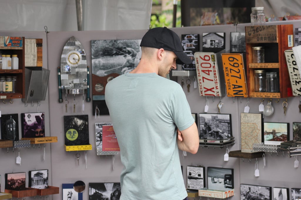 guy looking at stuff market.jpg